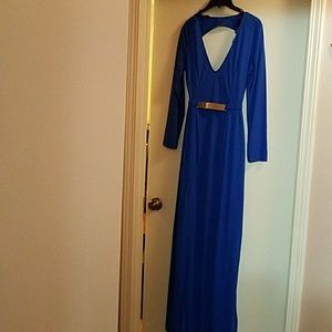 Royal blue gown with thigh split. Gold synched wai